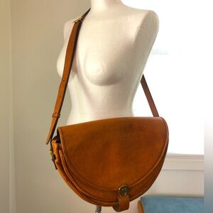 Vintage Etienne Aigner Crossbody Camel Leather Saddle Bag with brass accents